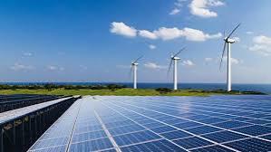 Solar panels and offshore wind turbines under a clear sky